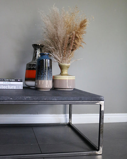 Polished Concrete Coffee Table Featuring Trio of Soho Home Vases and Three Popular Coffee Table Books